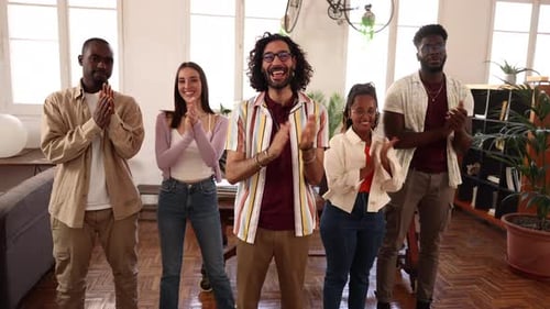 Confident Young Professionals Posing in a Stylish Workspace