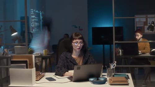 Timelapse of IT Specialists Working on Project in Office at Nightime