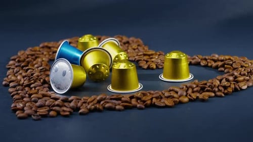Closeup on Blackblue Background Lie Roasted Coffee Beans Laid Out in the Shape of a Heart in the