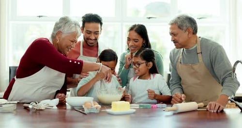 Happy Family Baking Together in a Bright Kitchen