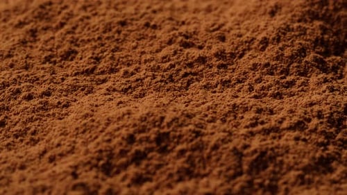Cocoa Powder Texture on Wooden Background Spoon with Aromatic Coffee Cacao Chocolate Macro Close Up