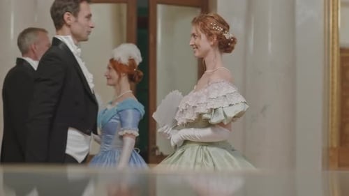 Elegant Couple in Period Costumes