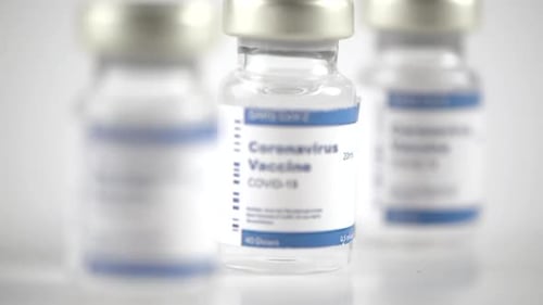Coronavirus Vaccine Vials In Hospital. - close up, rack focus