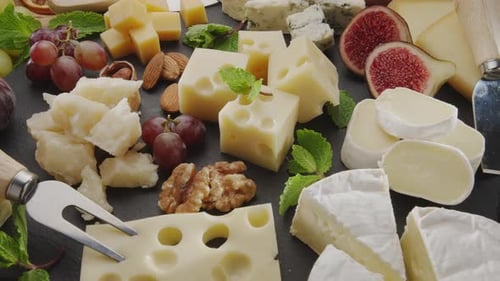 Delicious Cheese Board with Grapes, Figs, Nuts