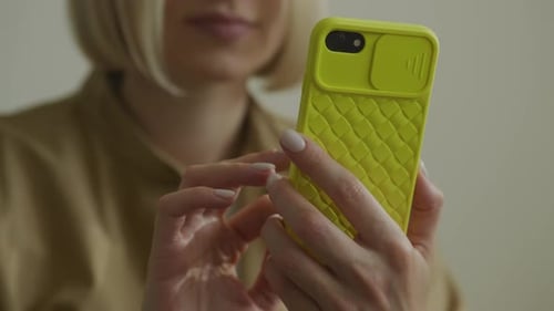 CloseUp of Woman Using Smartphone