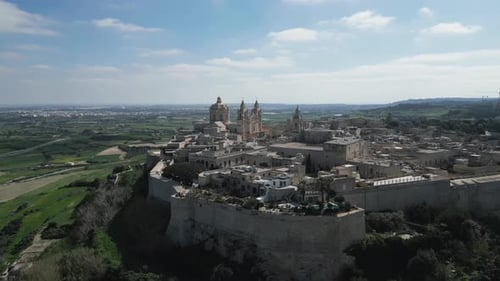 Aerial video of the walled city of St Paul's Cathedral, Malta