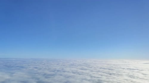 Serene Aerial View Tranquil Sky and Cloud Blanket Captured from High Altitude in Peaceful Flight V