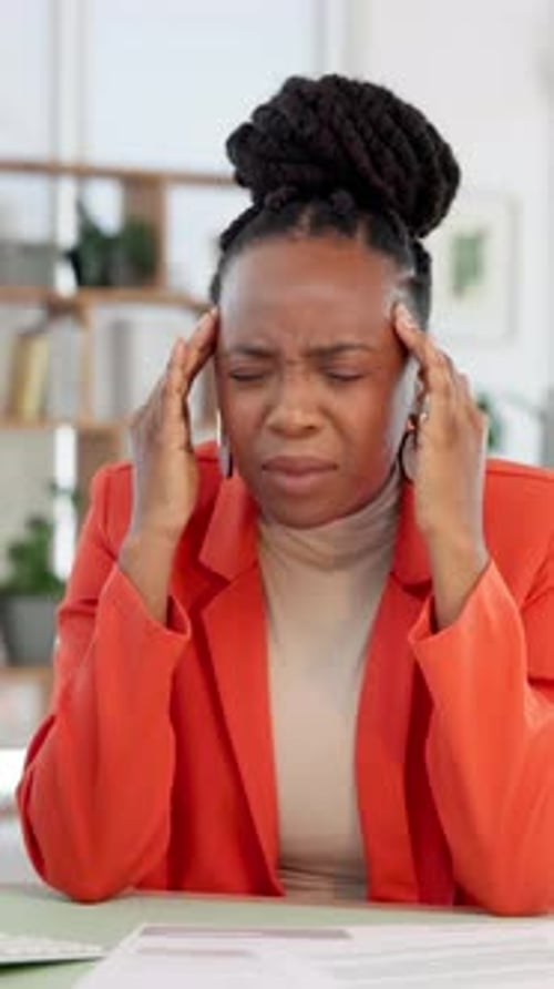 Headache, black woman and burnout in office with migraine, strain or stress
