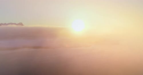 Colorful Sunrise Over Antarctic Ocean Coast Aerial