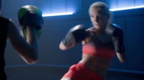 Female Boxer Practicing Drills at Urban Gym