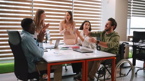 Office Workers Rejoice and Give High Five Signing Contract