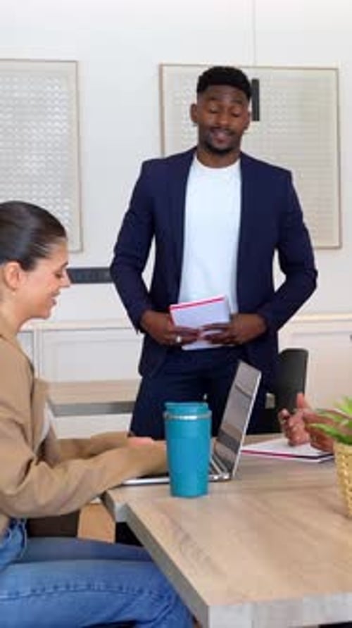 Business Professionals Discussing Plans During Meeting