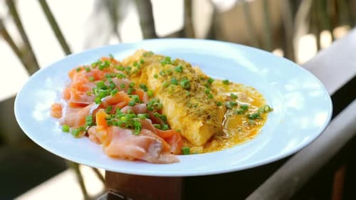 Delicious Omelet and Salmon Garnished with Green Onions