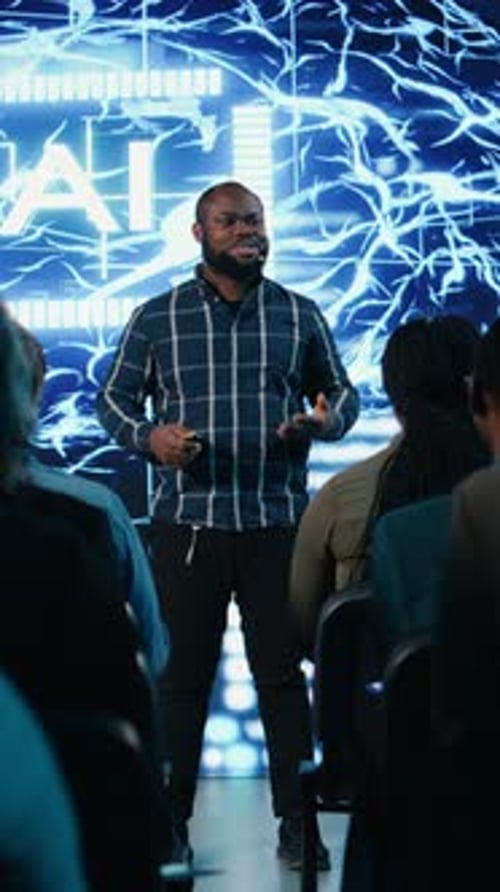Energetic Presenter Delivering AI Presentation to Seated Audience