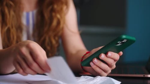 Closeup Woman Calculates Expenses on Bills Increased Utilities Prices List Female Bookkeeping Income