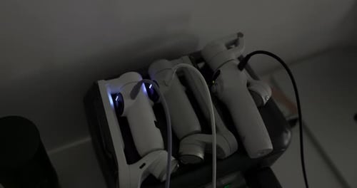 Virtual Reality Controllers Charging at Home