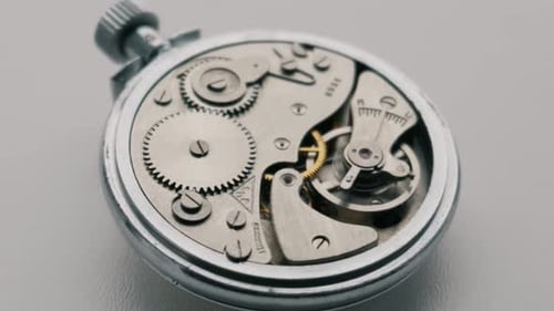 Macro View Of Vintage Mechanical Pocket Watch Gears Rotating Smoothly