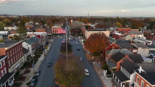 Aerial View of Quaint American Town With Flags