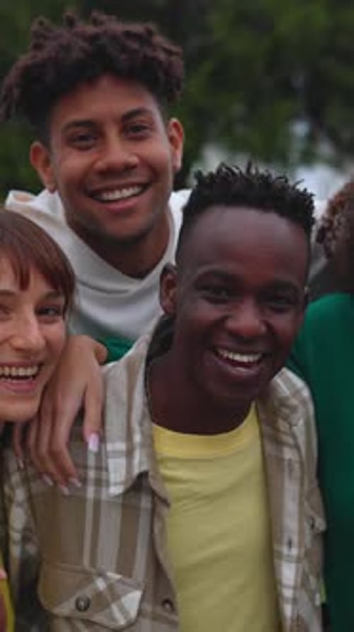 Smiling Young Friends Posing Together Outdoors