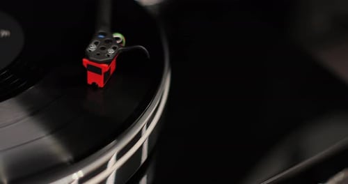 Vintage Record Player Spinning Black Vinyl Record