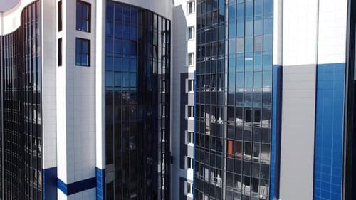 Skyscrapers Modern Glass Office Building Sunlight Urban Architecture Aerial View Down Tracking Shot