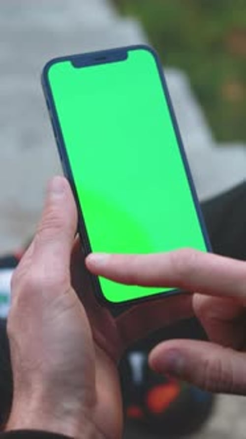 Demonstrating Usage of Smartphone Application in Outdoor Settings Emphasizing Lighting and Device