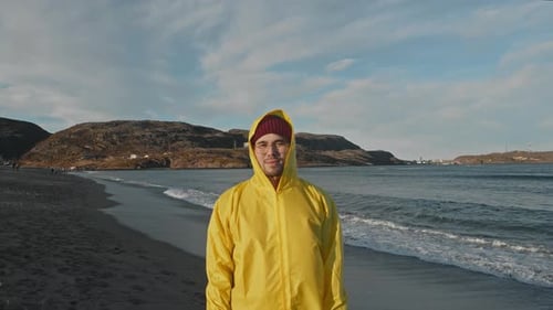 Young Adult on the Beach by the Ocean
