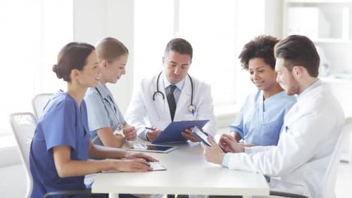 Hospital, Profession, People and Medicine Concept - Group of Happy Doctors With