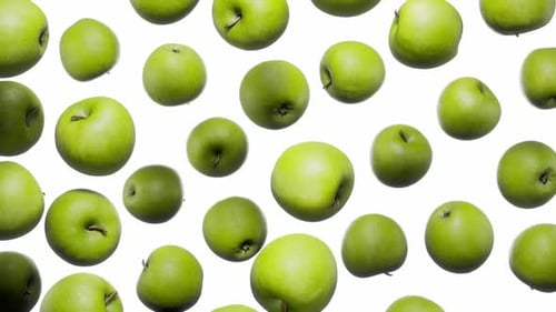 Nahtlos schwebende grüne Äpfel auf weißem Grund