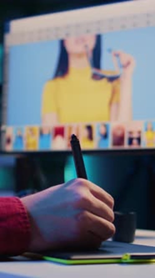 Vertical Video Photo Editor Editing Images Doing Color Correction in Post Production Company Using