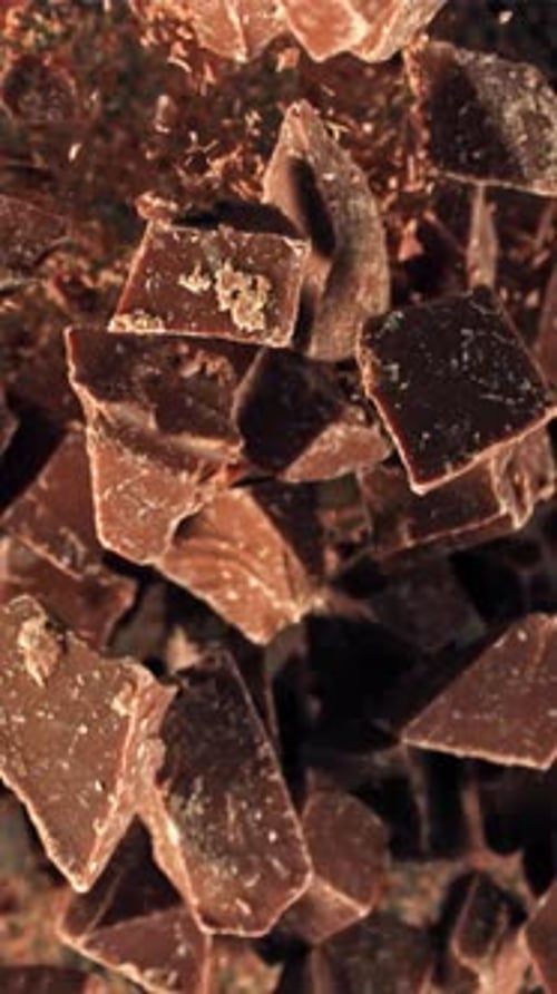Chunks of Chocolate Fly Up and Fall Down Filmed on a Highspeed Camera at 1000 Fps