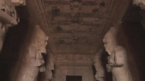 The entrance of Abu Simbel temple with Osiris statues.