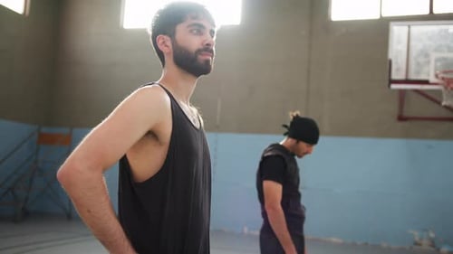 Guys Rotate Their Heads To Warm Up Neck Muscles In The Gym