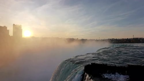 Golden sunrise over the majestic Niagara Falls. 4k