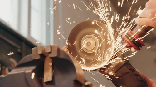 Close up of grinding metal with angle grinder