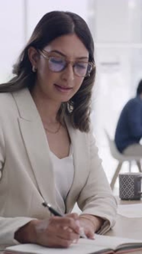 Business, woman or notebook with writing in office for calendar update, article schedule