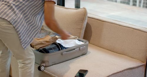 Person Packing Suitcase For Travel, Preparation