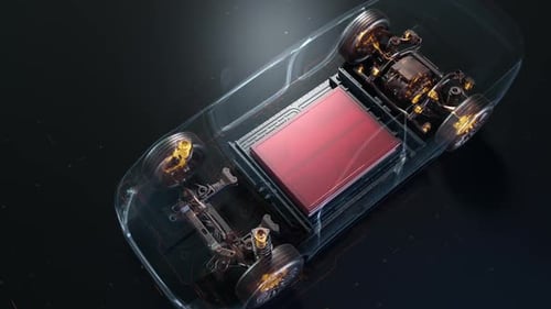 Electric vehicle chassis with red glowing battery pack.
