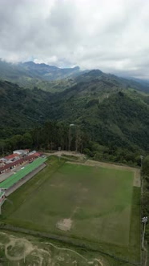 Aerial video over Salento towards a lush forested valley in the mountains of Colombia, Colombia