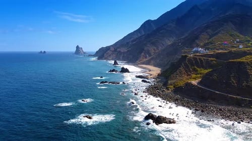 Waves of the Atlantic Ocean arrive to the rocky coast of Tenerife, the Canary Islands, Spain.