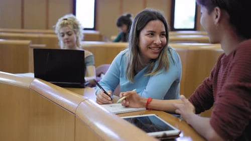 Young people studying inside university - School education concept