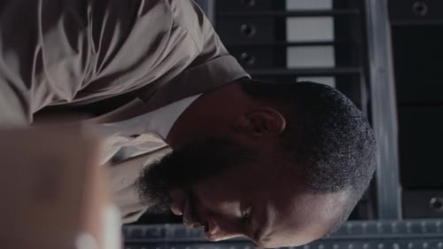 Man Working in Office Wearing Beige Blazer