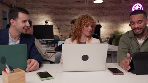 Coworkers Discussing Project in Slow Motion