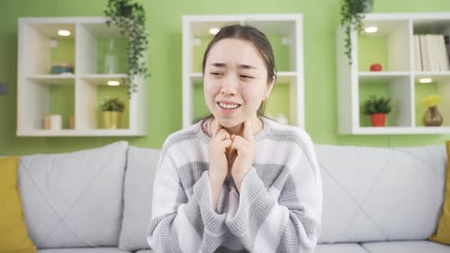 Woman With Throat Pain at Her Home Office