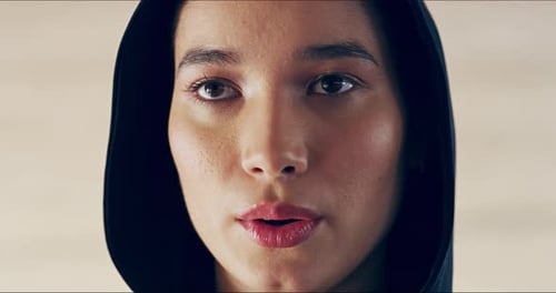 Woman's Face in Hoodie Close Up Portrait