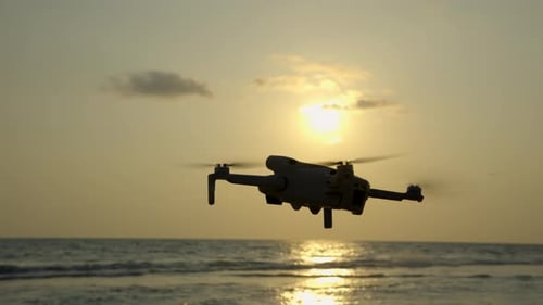 flying drone in beach side