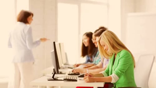 Education and School - Students with Teacher in Computer Class Academic