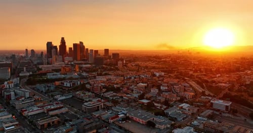 Panorama of Los Angeles, California, USA in the orange light of sunset.