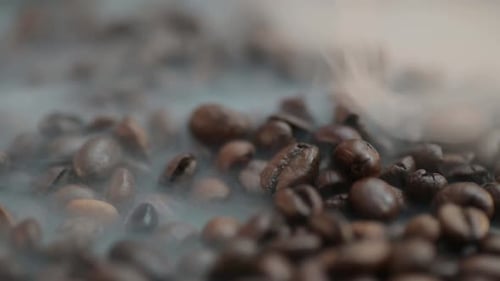 Close Up of Roasted Coffee Beans with Smoke