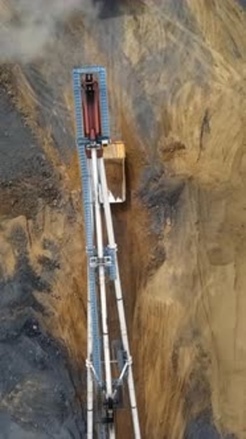 An Aerial View Showing Heavy Machinery at Work in the Process of Ore Extraction Activities Stock